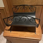 Black Curved Wrought Iron Fireplace Log Holder W/ Scroll Design. Fixed Price $55.00.