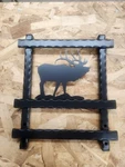 Sturdy Hammered Iron Metal Indoor Outdoor Firewood Rack Log Holder With Bull Elk. Fixed Price $325.00.