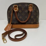 Louis Vuitton Alma Monogram Shoulder Bag Bb Brown Canvas. Fixed Price $750.00.