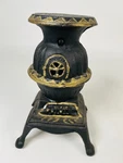 Vintage Blaze Black Cast Iron Footed Dollhouse Toy Pot Belly Stove 8" Tall. Fixed Price $50.00.