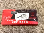 Vintage Deluxe Grayline Sliding 12 Cup Rack Rubber Coated Original Box. Fixed Price $22.00.