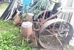 Antique Iron Steel Garden Plow Salvage With Metal Wheels Brown Rust. Fixed Price $700.00.