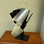 Ecofan Original Small 2 Blade Wood Stove Metallic With Black Base. Fixed Price $99.00.